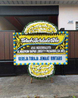 Papan Bunga Duka di Katongan